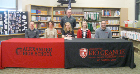 Alexander High School�s Jessica Cremeans is joined by family and coaches as she signs with Rio Grande 